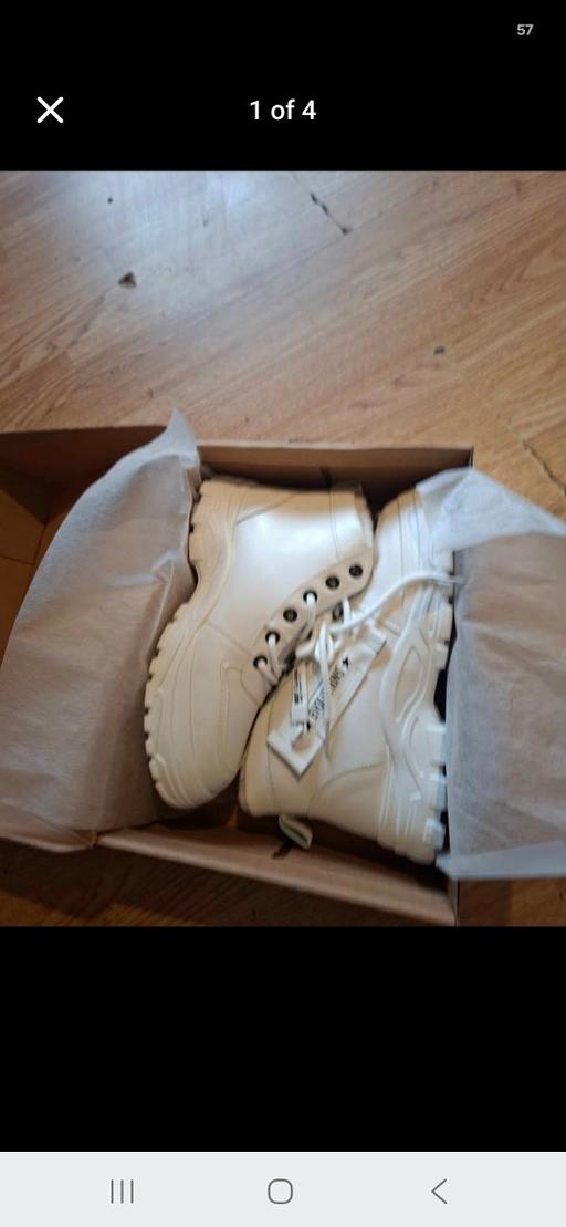  — woman's boots