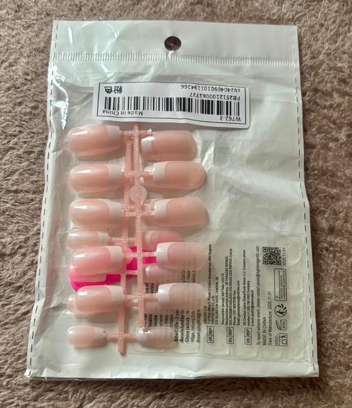  — New False Nails