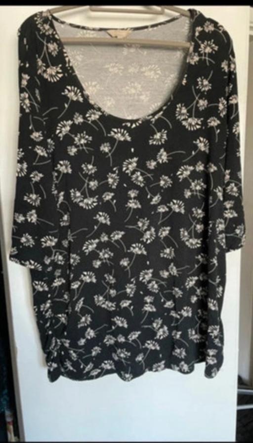  — Tunic