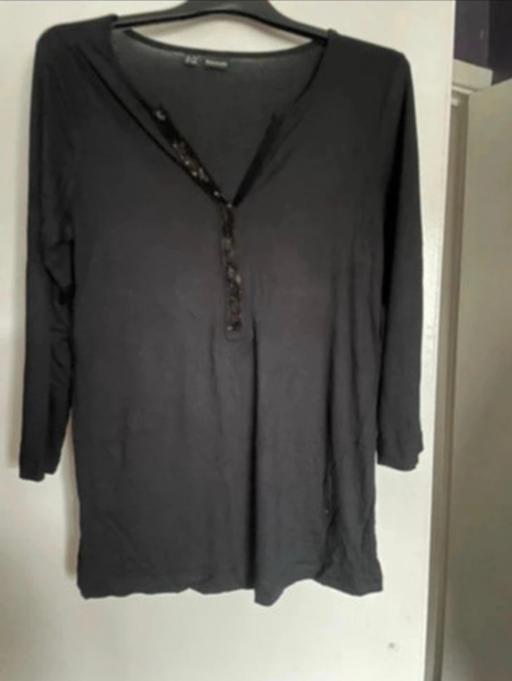  — Tunic