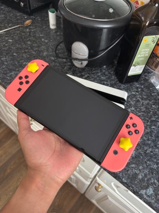  — Nintendo Switch OLED