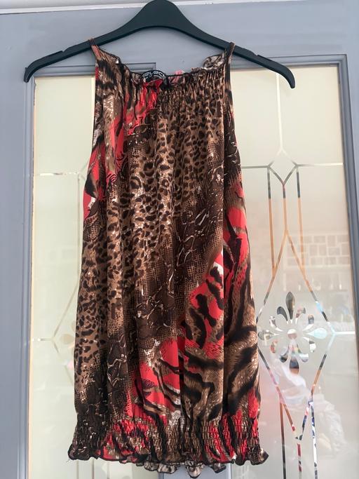 — Women’s top