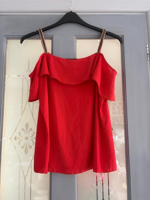  — Women’s top