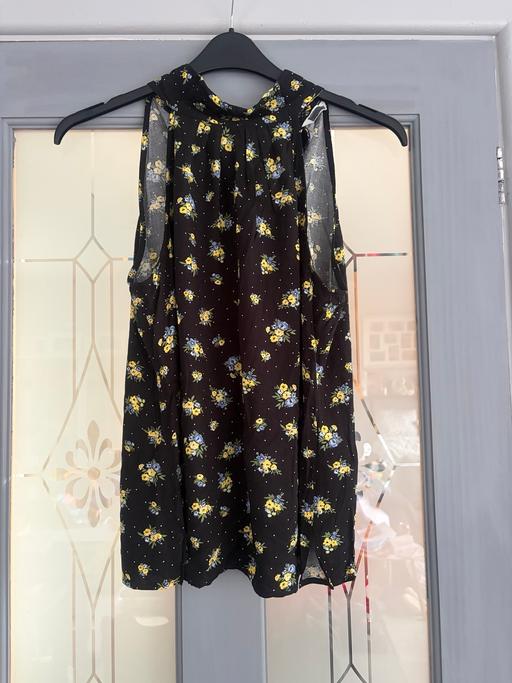  — Women’s top
