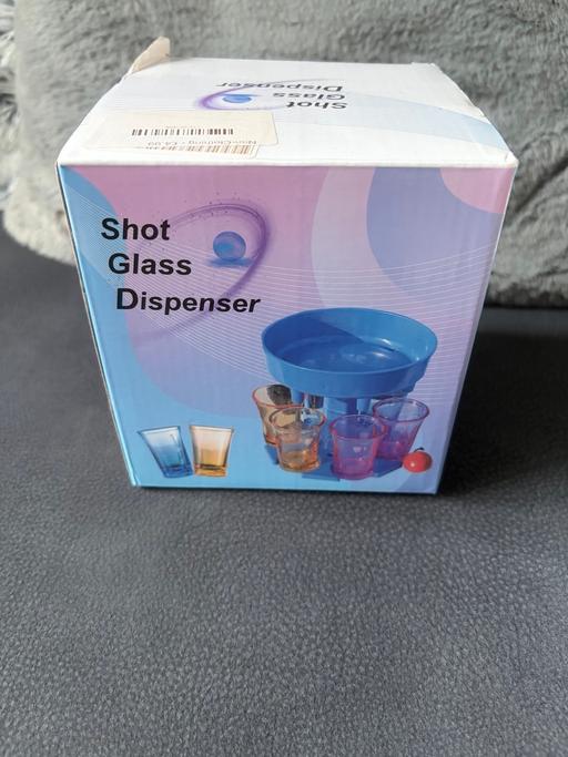  — Shot dispenser and glasses
