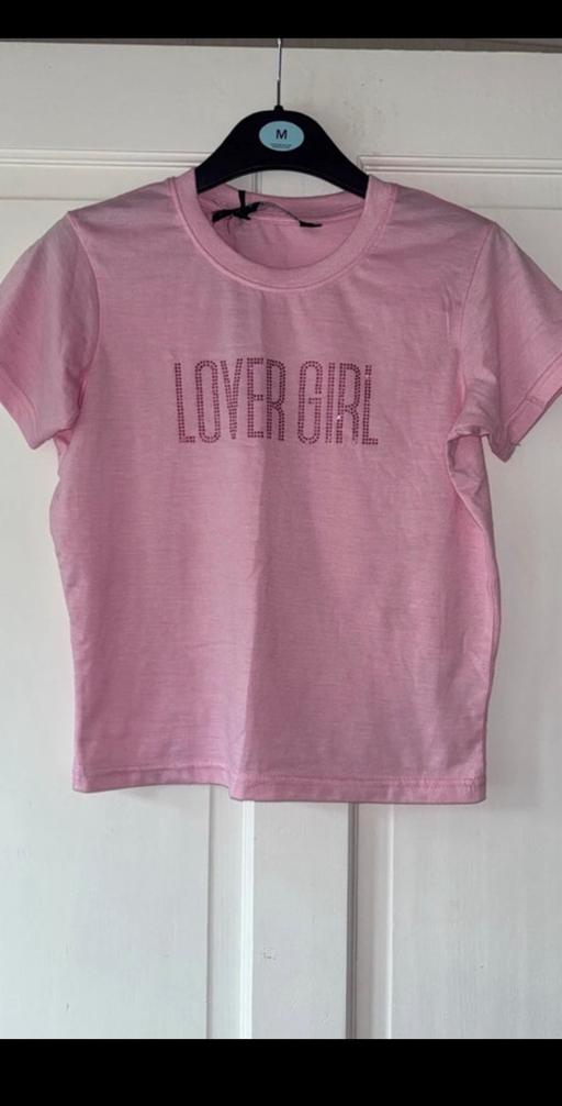  — women’s baby tee
