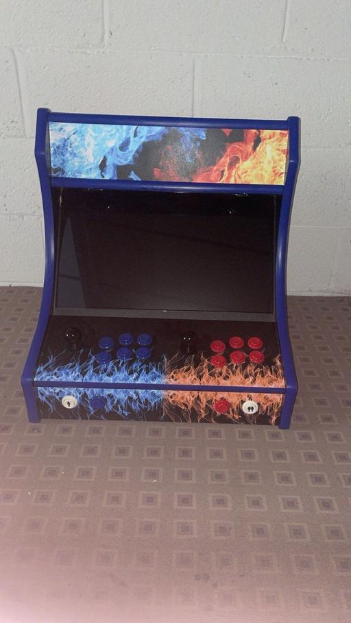  — Arcade machine