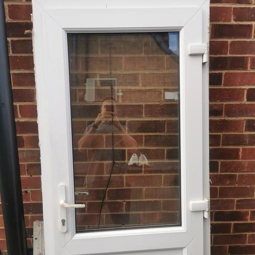 — pvc back door with half glass