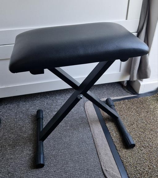  — piano bench
