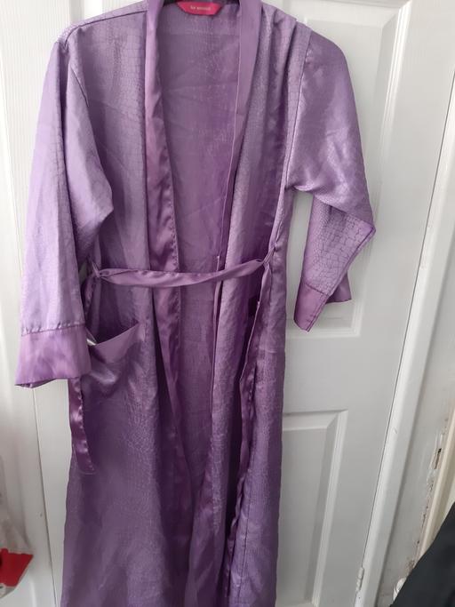  — ladies silk d gown
