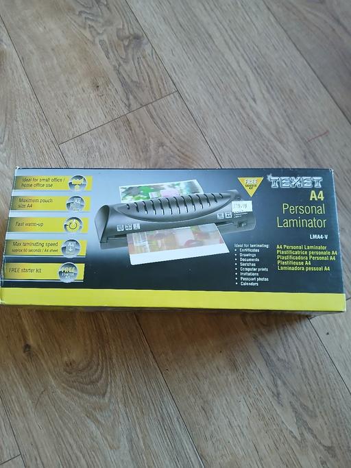  — Brand New Laminator
