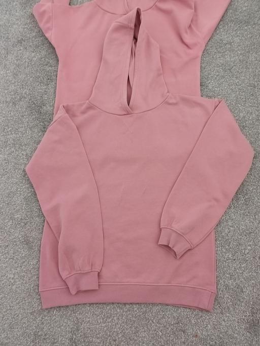  — PINK HOODIE. 2