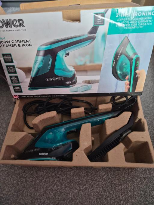  — steam iron and mat