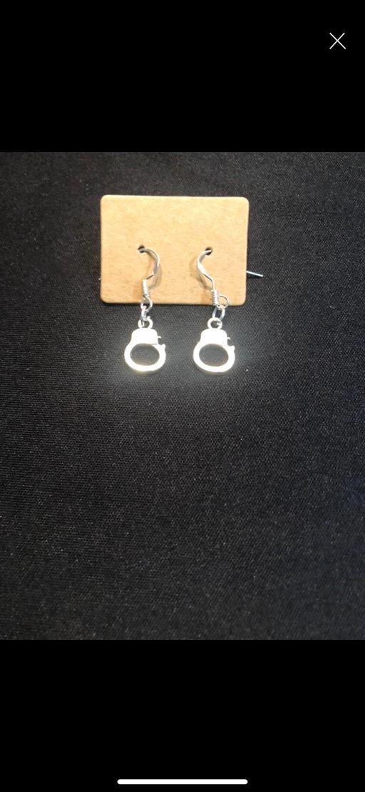  — Earrings