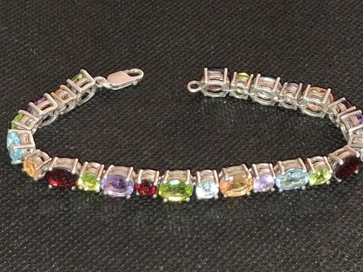  — Solid silver gem stone bracelet.