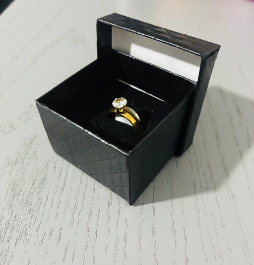  — Stainless steel gold ring (size 17)