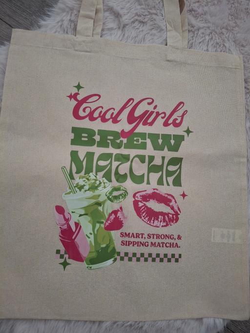  — cream tote bag