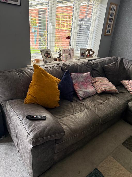  — Leather Corner Settee
