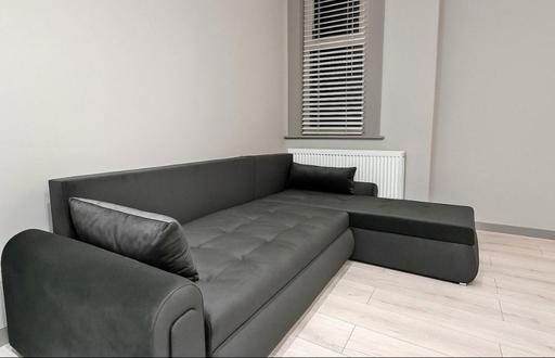  — Nourx charcoal corner sofa bed
