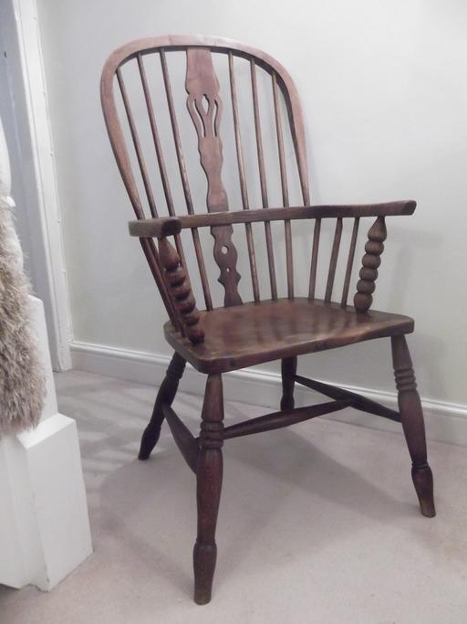  — Antique wooden armchair