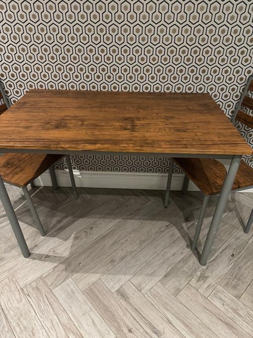  — Wood and metal table and chairs
