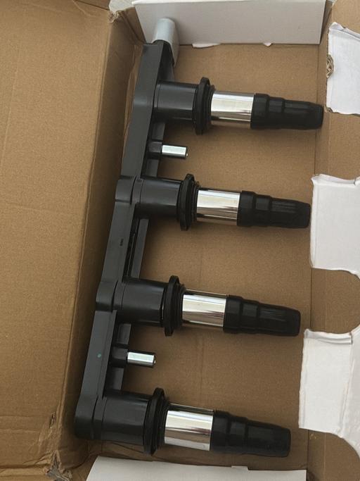  — New 4 Cylinder Ignition Coil P brand new