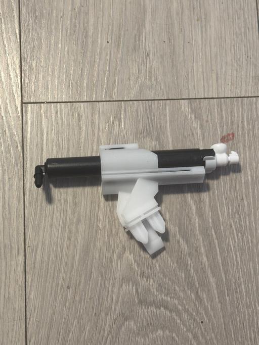  — Headlight Washer Jet Nozzle