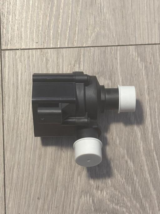  — Universal Electric Auxiliary Coolant