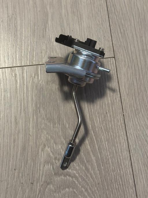  — turbocharger vacuum actuator