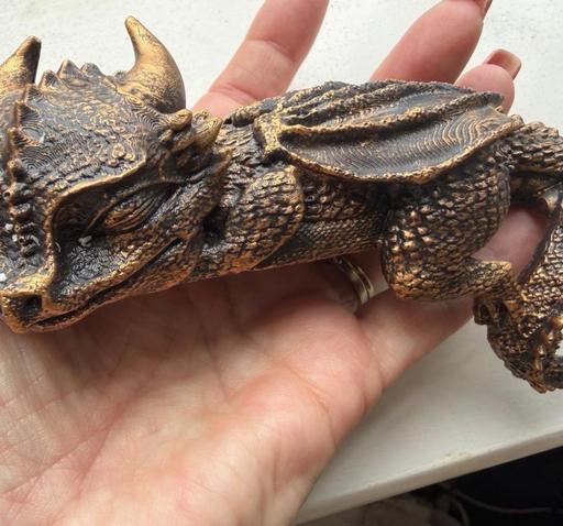  — Really cute sleeping dragon figurine