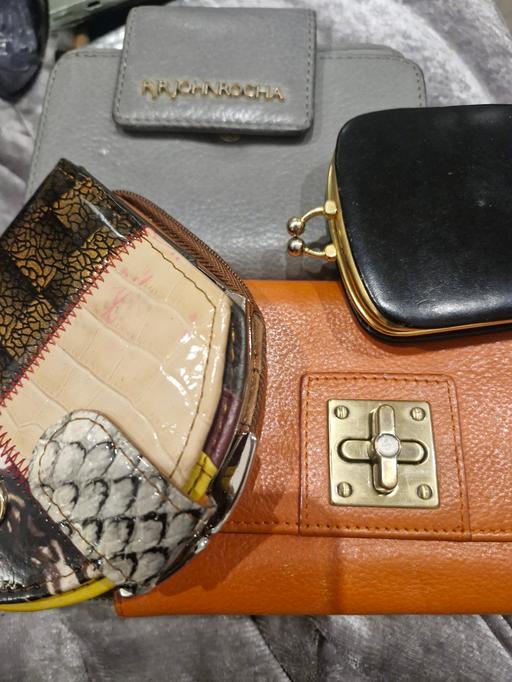  — purses