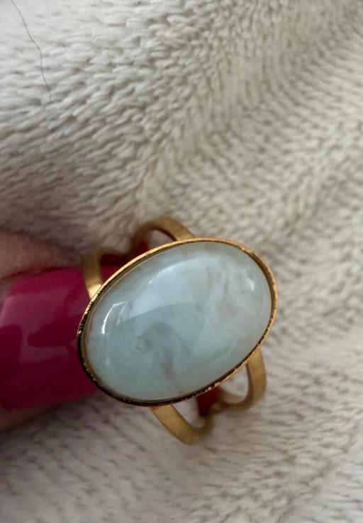  — Light blue opal effect adjustable ring