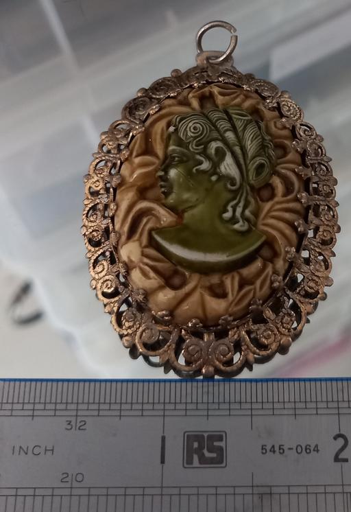  — Large vintage celluloid camoe pendant