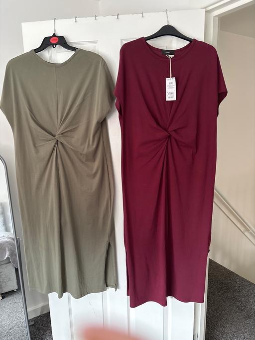  — Dress