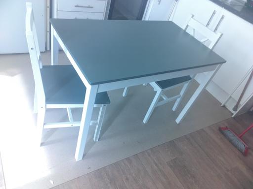  — table and chairs