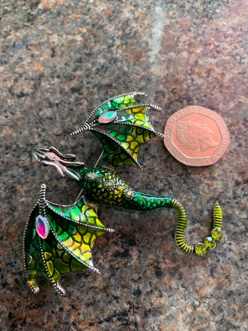  — Brooch buyer collects