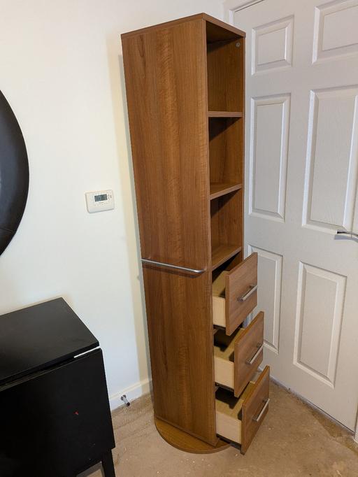  — rotating 3 drawer three shelves, and mirror
