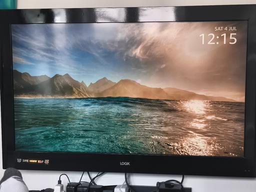  — 2x TV with wall bracket £40 each