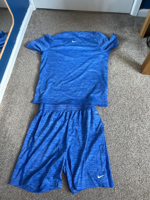  — Nike blue dri fit shorts and tshirt XL kids