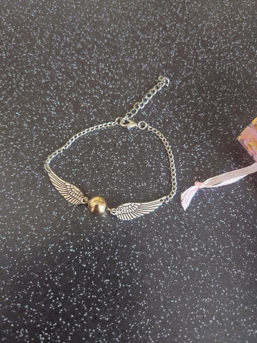  — Harry potter golden snitch bracelet