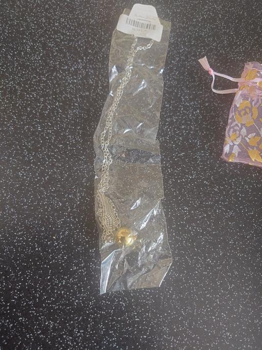  — Harry potter golden snitch necklace