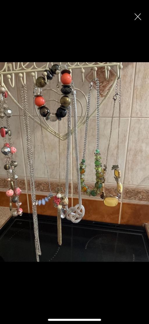  — Costume necklaces