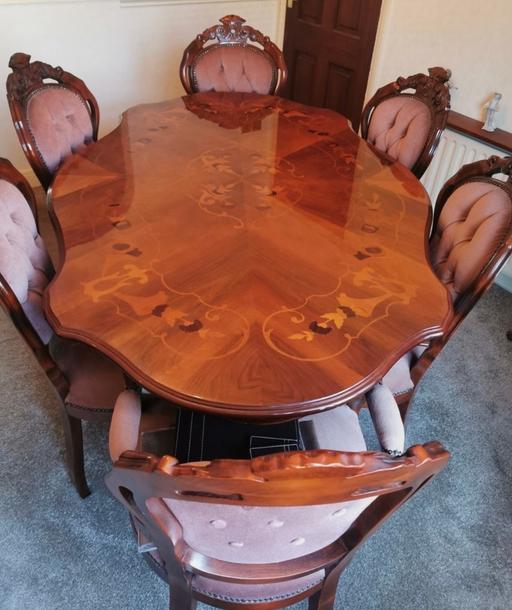  — Italian solid oak dining table.