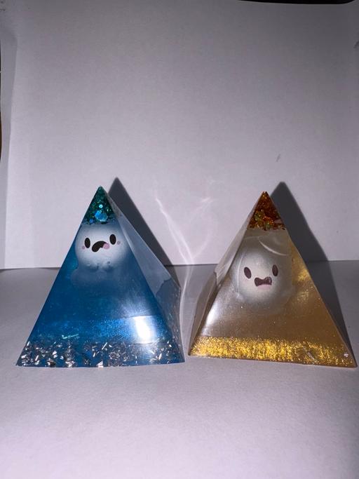  — Ghost paperweights