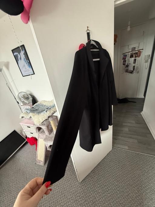  — Black blazer