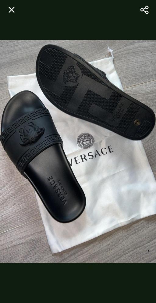  — versace sliders