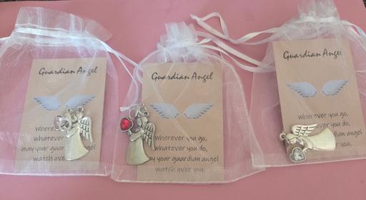  — 3 X ANGEL HUGS