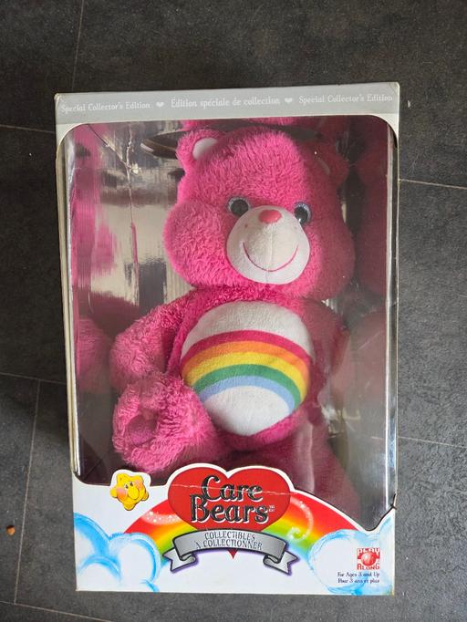  — 25th anniversary care bear.as the box to.