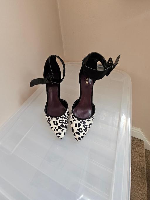  — Next shoes, size 5.