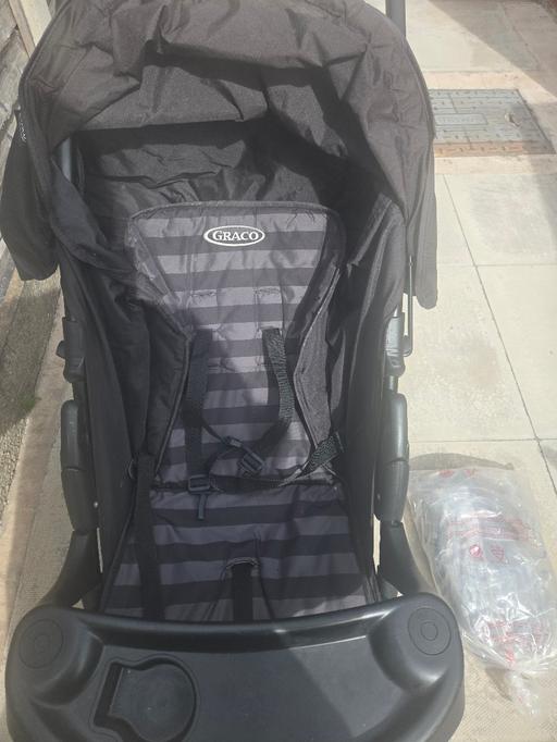  — graco push chair with baby bag and rain cover